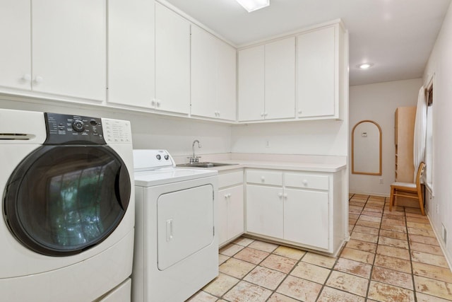 6 Shore Rd, North Oaks, MN 55127 - laundry room with washing machine and clothes dryer, cabinet space, and baseboards
