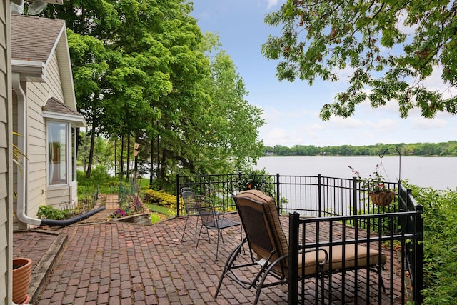 6 Shore Rd, North Oaks, MN 55127 - view of patio / terrace featuring a water view