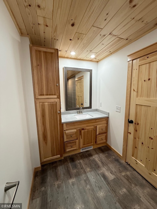 1616 130th Ave, Erin Prairie Twp, WI 54017 - bathroom featuring wooden ceiling, vanity, wood finished floors, recessed lighting, and baseboards