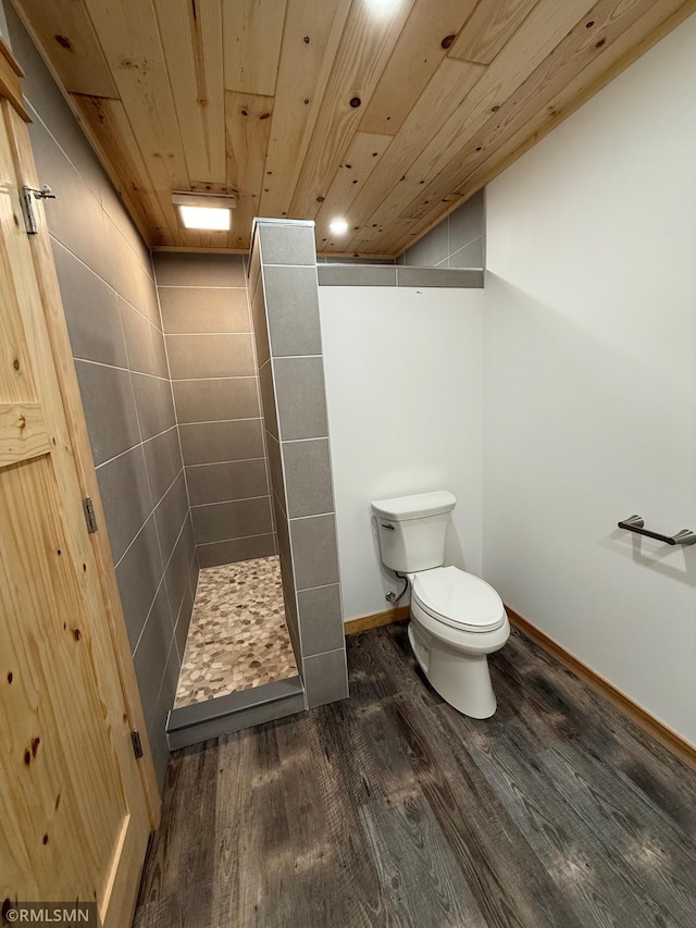 1616 130th Ave, Erin Prairie Twp, WI 54017 - full bathroom featuring wood finished floors, walk in shower, toilet, baseboards, and wooden ceiling