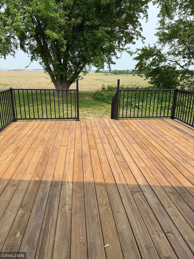 1616 130th Ave, Erin Prairie Twp, WI 54017 - wooden deck featuring a rural view and a lawn