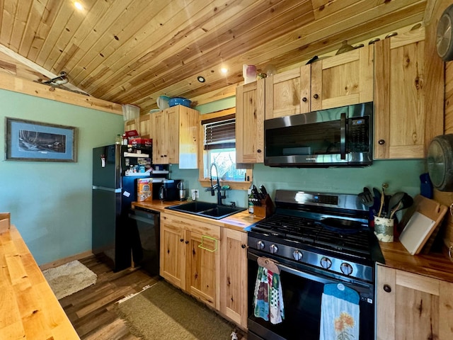 13739 429th Ave, Webster, SD 57274 - kitchen with black appliances, a sink, butcher block countertops, dark wood finished floors, and wood ceiling