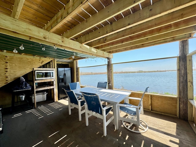 13739 429th Ave, Webster, SD 57274 - view of patio / terrace with a water view and outdoor dining space