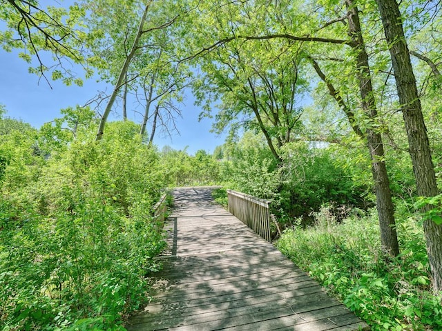 view of community with a forest view