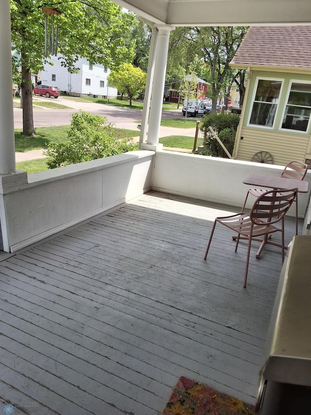 wooden deck with a porch
