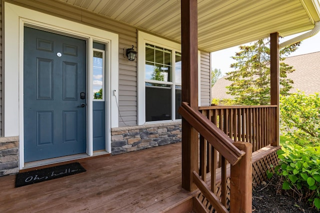 721 Quail Pkwy, Watertown, MN 55388 - doorway to property featuring stone siding and a porch
