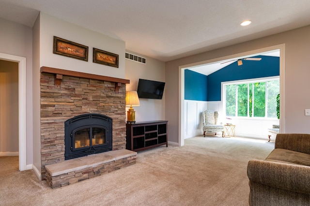 721 Quail Pkwy, Watertown, MN 55388 - carpeted living area with a ceiling fan, a fireplace, baseboards, and vaulted ceiling