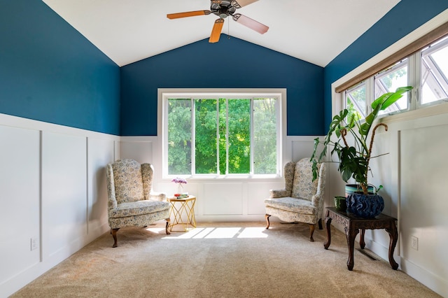721 Quail Pkwy, Watertown, MN 55388 - living area featuring wainscoting, carpet flooring, lofted ceiling, ceiling fan, and a decorative wall