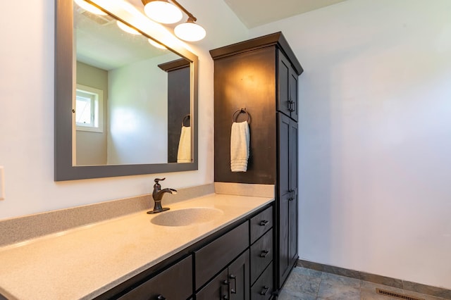 721 Quail Pkwy, Watertown, MN 55388 - bathroom featuring vanity and baseboards