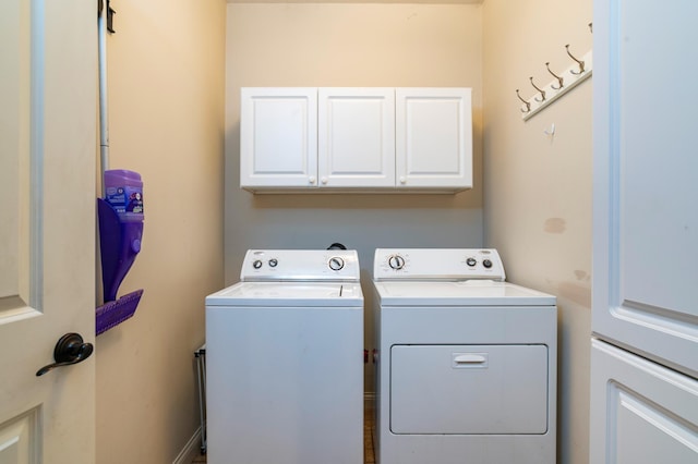 721 Quail Pkwy, Watertown, MN 55388 - laundry area featuring cabinet space and washer and clothes dryer
