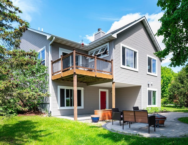 721 Quail Pkwy, Watertown, MN 55388 - rear view of house with a chimney, a patio area, a yard, and a deck