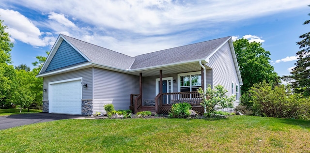 721 Quail Pkwy, Watertown, MN 55388 - ranch-style house featuring a porch, a garage, driveway, roof with shingles, and a front lawn