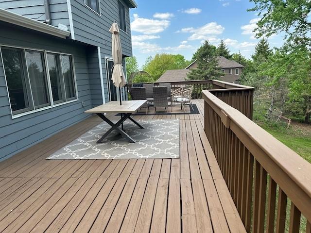 4180 Reading Rd, Eagan, MN 55123 - wooden deck with outdoor dining area