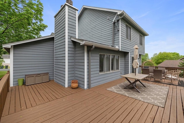 4180 Reading Rd, Eagan, MN 55123 - wooden deck with outdoor dining space