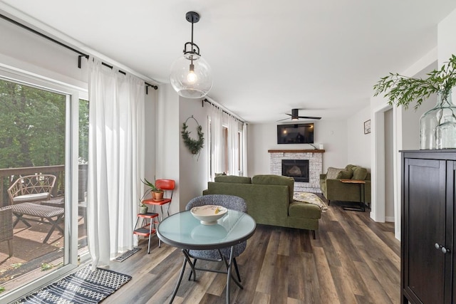 4180 Reading Rd, Eagan, MN 55123 - living area with a fireplace, dark wood-type flooring, and ceiling fan