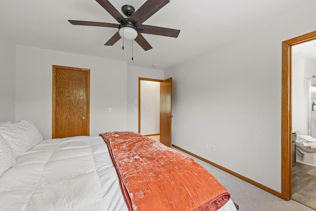4180 Reading Rd, Eagan, MN 55123 - bedroom with baseboards, connected bathroom, a ceiling fan, and light carpet