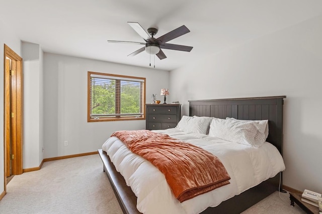 4180 Reading Rd, Eagan, MN 55123 - bedroom featuring light carpet, baseboards, and a ceiling fan