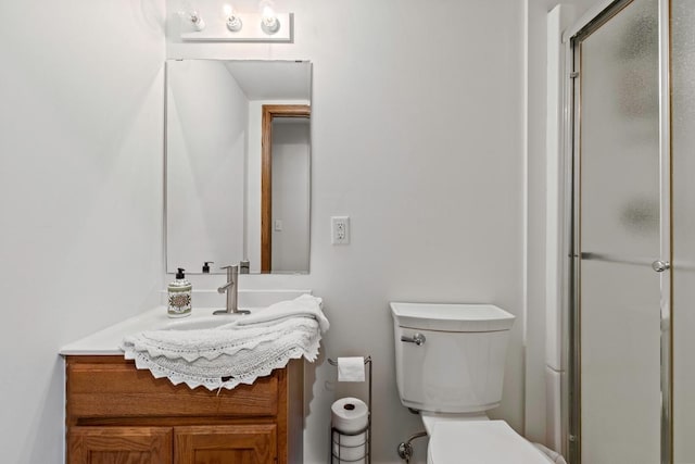 4180 Reading Rd, Eagan, MN 55123 - bathroom with toilet, vanity, and a stall shower