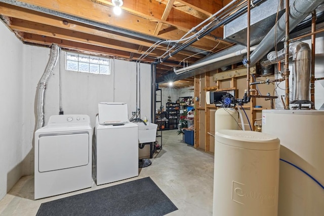 4180 Reading Rd, Eagan, MN 55123 - basement with washing machine and clothes dryer and a sink