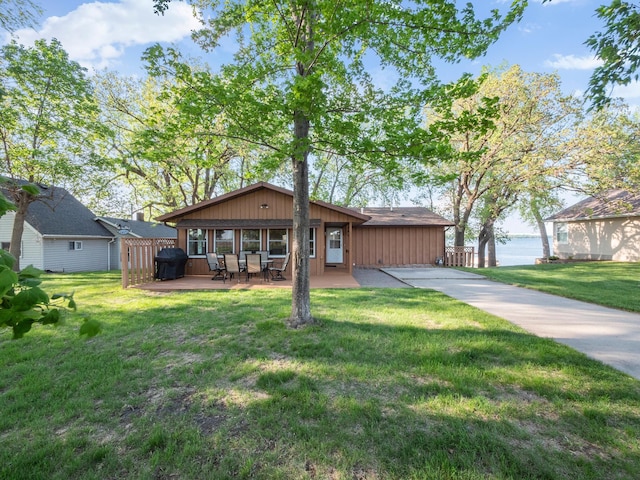 28604 Shore Dr, Starbuck, MN 56381 - view of front of home with a patio and a front lawn