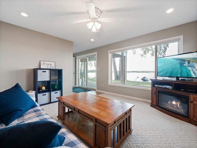 28604 Shore Dr, Starbuck, MN 56381 - living room with a ceiling fan, recessed lighting, light carpet, and baseboards