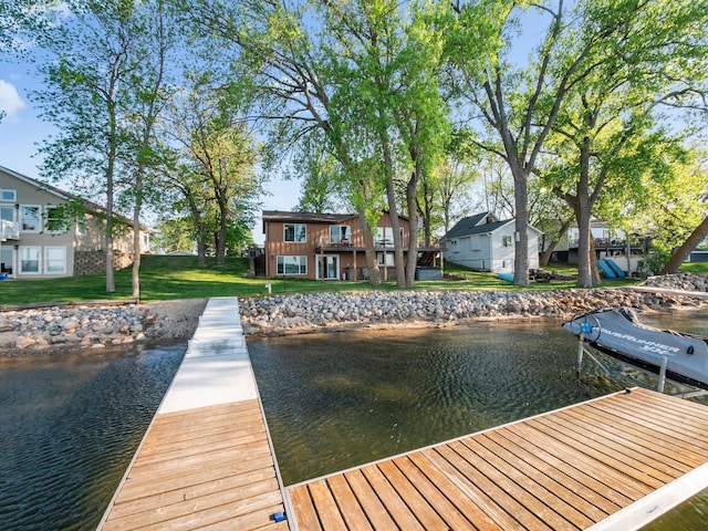 28604 Shore Dr, Starbuck, MN 56381 - dock area featuring a water view, a yard, and a residential view
