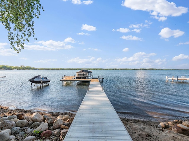 28604 Shore Dr, Starbuck, MN 56381 - dock featuring a water view