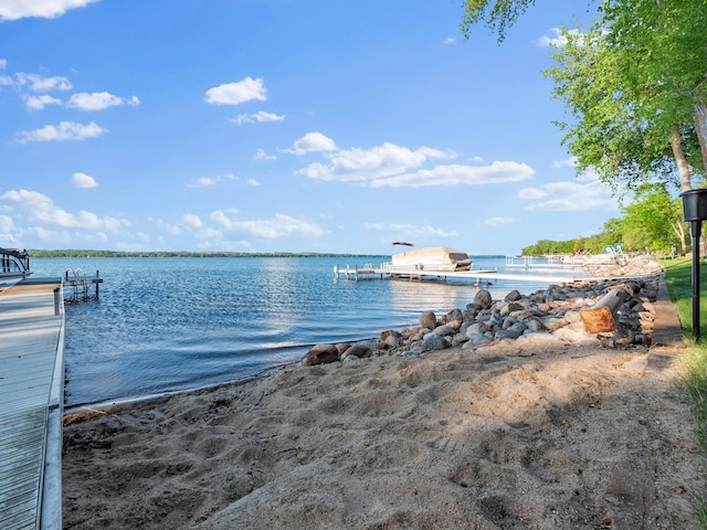 28604 Shore Dr, Starbuck, MN 56381 - water view featuring a dock