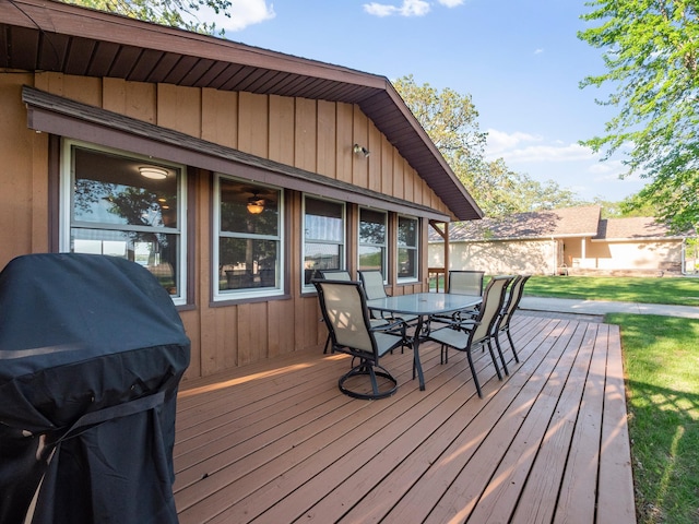 28604 Shore Dr, Starbuck, MN 56381 - wooden terrace with outdoor dining area, grilling area, and a yard