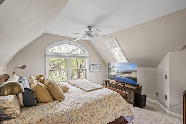 bedroom with lofted ceiling, carpet floors, an AC wall unit, a ceiling fan, and baseboards