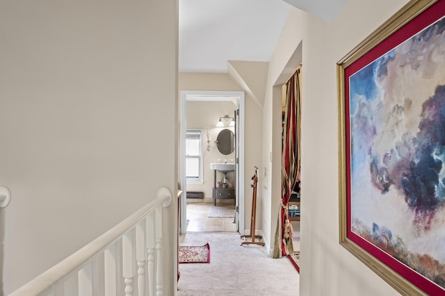 corridor with carpet floors