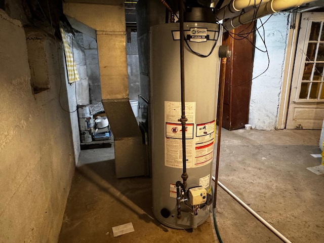 208 Cush St, Jackson, MN 56143 - utility room featuring gas water heater