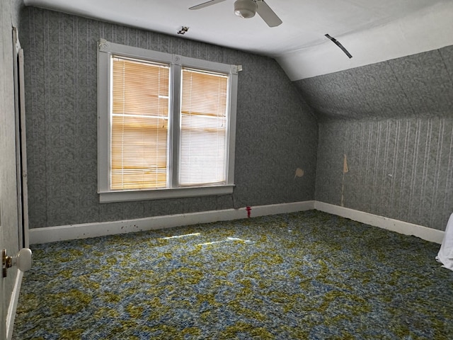208 Cush St, Jackson, MN 56143 - additional living space with a ceiling fan, vaulted ceiling, carpet floors, and baseboards