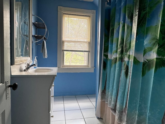 208 Cush St, Jackson, MN 56143 - bathroom with tile patterned floors, vanity, and a shower with shower curtain