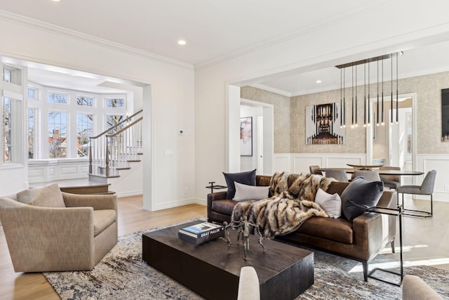 1301 Mount Curve Ave, Minneapolis, MN 55403 - living room featuring light wood finished floors, stairway, wainscoting, crown molding, and recessed lighting