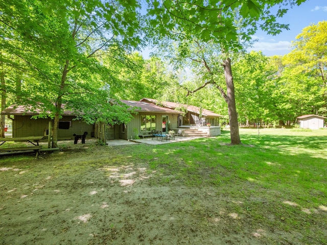 2536 Sandhill Ln NE, Carlos Twp, MN 56308 - view of green lawn with a patio area