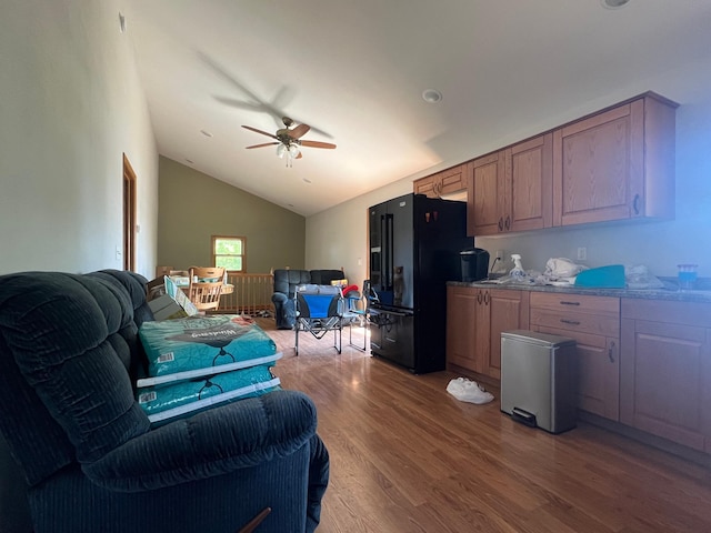 34373 State Highway 7, Foster Twp, MN 56225 - living area featuring ceiling fan, wood finished floors, and lofted ceiling