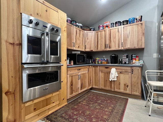 34373 State Highway 7, Foster Twp, MN 56225 - kitchen with double oven, vaulted ceiling, and dark countertops