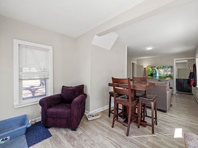 4959 5th St NE, Columbia Heights, MN 55421 - dining space with light wood-style floors and baseboards