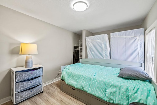 4959 5th St NE, Columbia Heights, MN 55421 - bedroom with wood finished floors and baseboards