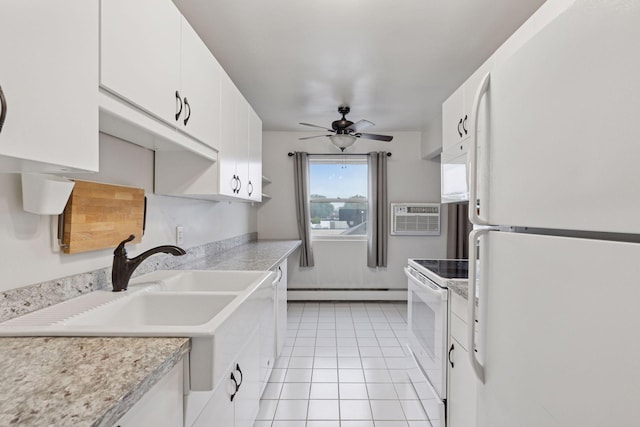 1540 Ashland Ave Unit 3, Saint Paul, MN 55104 - kitchen with white appliances, a baseboard heating unit, a ceiling fan, and light countertops