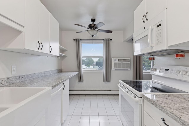1540 Ashland Ave Unit 3, Saint Paul, MN 55104 - kitchen with white appliances, a baseboard heating unit, a ceiling fan, light countertops, and a wall mounted AC