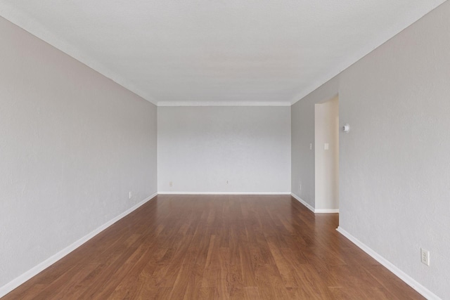 1540 Ashland Ave Unit 3, Saint Paul, MN 55104 - empty room with wood finished floors, baseboards, and crown molding