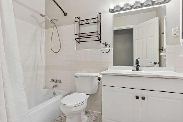 1540 Ashland Ave Unit 3, Saint Paul, MN 55104 - full bath featuring tile walls, shower / bath combo, vanity, toilet, and tile patterned floors
