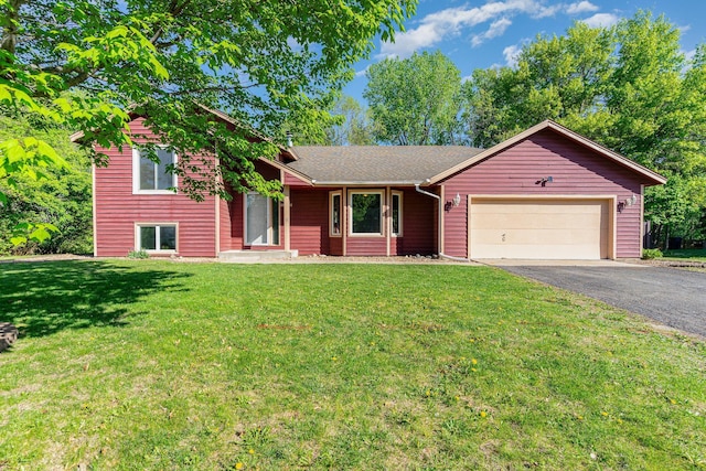 12761 Ethelton Way, Apple Valley, MN 55124 - view of front of property with a garage, driveway, and a front lawn