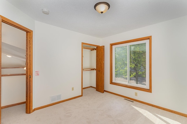 12761 Ethelton Way, Apple Valley, MN 55124 - unfurnished bedroom featuring carpet, baseboards, and a closet