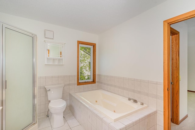 12761 Ethelton Way, Apple Valley, MN 55124 - full bathroom featuring a tub with jets, toilet, a stall shower, and tile patterned floors