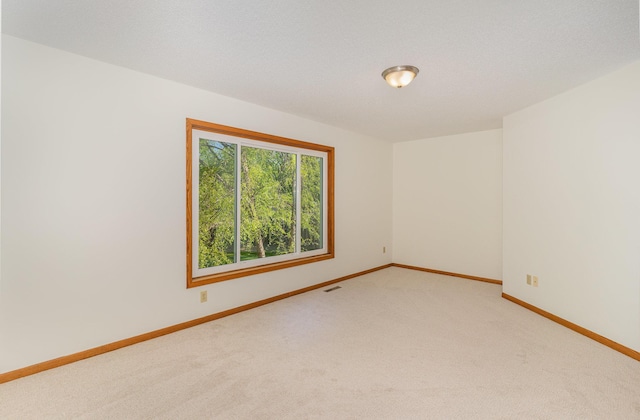 12761 Ethelton Way, Apple Valley, MN 55124 - spare room with light carpet and baseboards