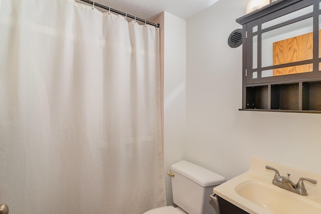 12761 Ethelton Way, Apple Valley, MN 55124 - bathroom with toilet, a textured ceiling, vanity, and a shower with shower curtain