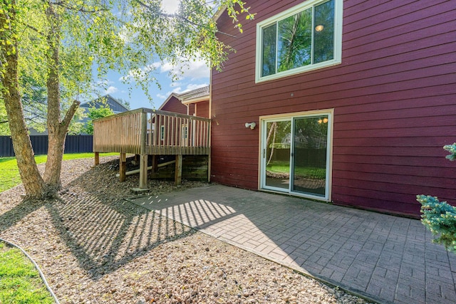 12761 Ethelton Way, Apple Valley, MN 55124 - rear view of house featuring a patio area, a wooden deck, and fence